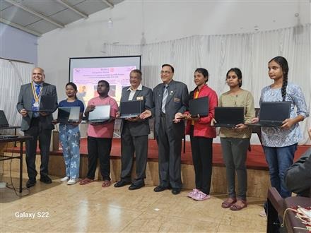 Distribution of Laptops provided by CSR partner Commvault Systems India